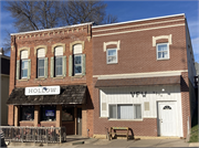 102 W MAIN ST, a Commercial Vernacular large retail building, built in Montfort, Wisconsin in 1894.