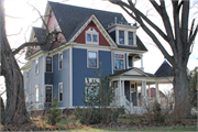 W1901 USH 16, S SIDE USH 16, OPPOSITE INTERS W/ STATE HIGHWAY 146, a Queen Anne house, built in Fountain Prairie, Wisconsin in 1900.