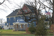 W1901 USH 16, S SIDE USH 16, OPPOSITE INTERS W/ STATE HIGHWAY 146, a Queen Anne house, built in Fountain Prairie, Wisconsin in 1900.