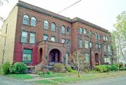 2105-2109 OGDEN AVE AND 1700-1714 N 21ST ST, a Romanesque Revival apartment/condominium, built in Superior, Wisconsin in 1890.