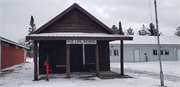 N9130 FOREST LN  (AKA PRICE CO FAIRGROUNDS OFF COUNTY HIGHWAY H, 1 MI E OF PHILLIPS), a Front Gabled school-one to six room, built in Phillips, Wisconsin in 1887.