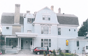 116 10TH ST, a Dutch Colonial Revival house, built in Racine, Wisconsin in 1893.