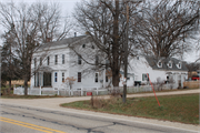 10502 STH 213, NORTH SIDE OF 213, EAST OF LUTHER VALLEY RD, a Greek Revival house, built in Plymouth, Wisconsin in 1846.