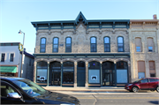 114-118 N LUDINGTON, a Early Gothic Revival large retail building, built in Columbus, Wisconsin in 1877.
