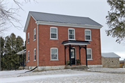 1724 County Highway H, a Greek Revival house, built in Smelser, Wisconsin in 1870.