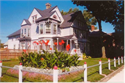 1242 MAIN ST, a Queen Anne house, built in Racine, Wisconsin in 1856.