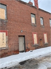 307 S KNOWLES AVE, a Commercial Vernacular large retail building, built in New Richmond, Wisconsin in 1899.