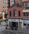 128 N 3RD ST, a Commercial Vernacular small retail building, built in La Crosse, Wisconsin in 1883.