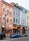 118 S 3RD ST, a Italianate small retail building, built in La Crosse, Wisconsin in 1874.