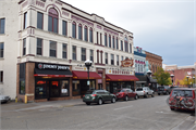 306-312 PEARL ST, a Romanesque Revival large retail building, built in La Crosse, Wisconsin in 1892.