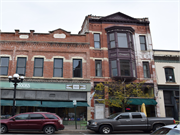327 PEARL ST, a Queen Anne small retail building, built in La Crosse, Wisconsin in 1885.