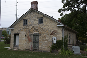 440 N JACKSON ST, a Greek Revival house, built in Janesville, Wisconsin in 1857.