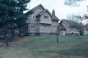 202 WATER ST, a Shingle Style house, built in Mosinee, Wisconsin in 1912.