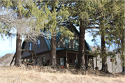 E2666 STATE TRUNK HIGHWAY 162, a Dutch Colonial Revival house, built in Hamburg, Wisconsin in 1910.
