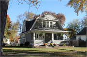 930 DIVISION ST, a Dutch Colonial Revival house, built in Green Bay, Wisconsin in 1938.