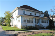 138-140 S JACKSON ST, a American Foursquare house, built in Green Bay, Wisconsin in 1915.