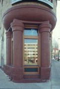 121-125 KING ST (106 E DOTY ST), a Romanesque Revival retail building, built in Madison, Wisconsin in 1889.