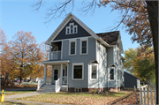 301-303 S OAKLAND AVE, a Queen Anne duplex/two-flat, built in Green Bay, Wisconsin in 1896.