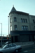 121-125 KING ST (106 E DOTY ST), a Romanesque Revival retail building, built in Madison, Wisconsin in 1889.