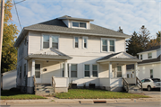 1132-1134 SHAWANO AVE, a American Foursquare duplex/two-flat, built in Green Bay, Wisconsin in 1931.