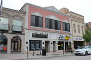 209-211 N WASHINGTON ST, a Commercial Vernacular large retail building, built in Green Bay, Wisconsin in 1869.