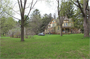 301 S Division St, a Queen Anne house, built in Roberts, Wisconsin in 1899.