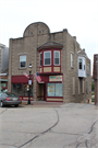 125 S Main St, a Commercial Vernacular retail building, built in West Bend, Wisconsin in 1907.