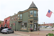 136 S Main St (AKA 135 5th Ave), a Queen Anne small retail building, built in West Bend, Wisconsin in 1898.