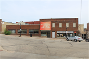 508 Hickory St, a Commercial Vernacular automobile showroom, built in West Bend, Wisconsin in 1927.