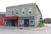 162 S Main St, a Commercial Vernacular large retail building, built in West Bend, Wisconsin in 1869.