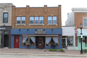 113 - 115 S Main St, a Commercial Vernacular large retail building, built in West Bend, Wisconsin in 1924.