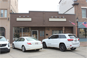 237 - 239 N Main St, a Commercial Vernacular small retail building, built in West Bend, Wisconsin in 1954.