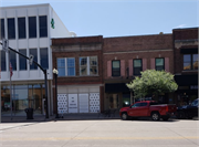 106 W WISCONSIN AVE, a Commercial Vernacular small retail building, built in Neenah, Wisconsin in 1873.
