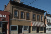 506-508 E WILSON ST, a Italianate grocery, built in Madison, Wisconsin in 1871.