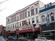 306-312 PEARL ST, a Romanesque Revival large retail building, built in La Crosse, Wisconsin in 1892.