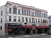 306-312 PEARL ST, a Romanesque Revival large retail building, built in La Crosse, Wisconsin in 1892.