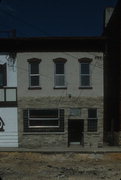 518 E WILSON ST, a Italianate retail building, built in Madison, Wisconsin in 1886.