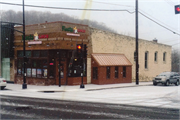 121 N CASCADE ST (AKA 102 2ND AVE), a Commercial Vernacular retail building, built in Osceola, Wisconsin in 1904.