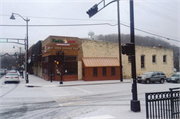 121 N CASCADE ST (AKA 102 2ND AVE), a Commercial Vernacular small retail building, built in Osceola, Wisconsin in 1904.