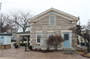 126 E GRAND AVE, a Greek Revival house, built in Port Washington, Wisconsin in 1848.