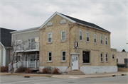601 N WISCONSIN ST, a Greek Revival tavern/bar, built in Port Washington, Wisconsin in 1865.