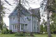 8833 W MEQUON RD / STATE HIGHWAY 167, a Queen Anne house, built in Mequon, Wisconsin in 1895.