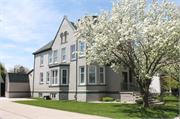 1111 HURON ST, a Queen Anne house, built in Manitowoc, Wisconsin in 1898.