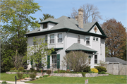 1004 ST CLAIR ST, a American Foursquare house, built in Manitowoc, Wisconsin in 1899.