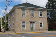 102 S Milwaukee St, a Greek Revival lodging-inn, built in Theresa, Wisconsin in 1860.