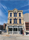 320 E CLYBOURN AVE, a Italianate retail building, built in Milwaukee, Wisconsin in 1874.