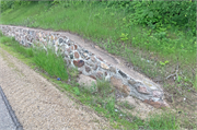State Highway 110, a fence/wall, built in Dupont, Wisconsin in 1936.