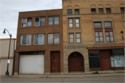909-913 S MAIN ST, a Romanesque Revival large retail building, built in Oshkosh, Wisconsin in 1902.