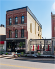 11 N MAIN ST, a Italianate small retail building, built in Janesville, Wisconsin in 1865.