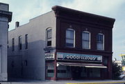 1812 HALL AVE, a Commercial Vernacular small retail building, built in Marinette, Wisconsin in 1883.